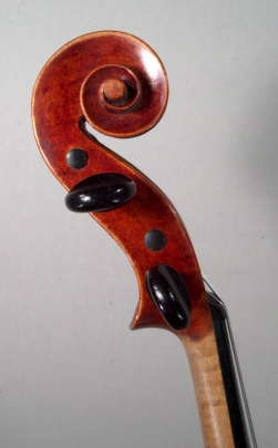 head profile of a new violin made by Roland Terrier, 1979
