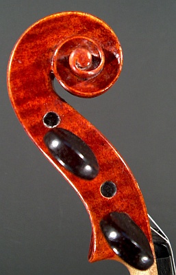 head profile of a new violin made by Roland Terrier, 1980